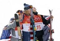 Freestyle Skiing - Pyeongchang 2018 Winter Olympics - Men's Ski Halfpipe Final - Phoenix Snow Park - Pyeongchang, South Korea - February 22, 2018 - Bronze medallist Nico Porteous of New Zealand, gold medallist David Wise of the U.S. and silver medallist Alex Ferreira of the U.S. attend a victory ceremony. REUTERS/Jorge Silva