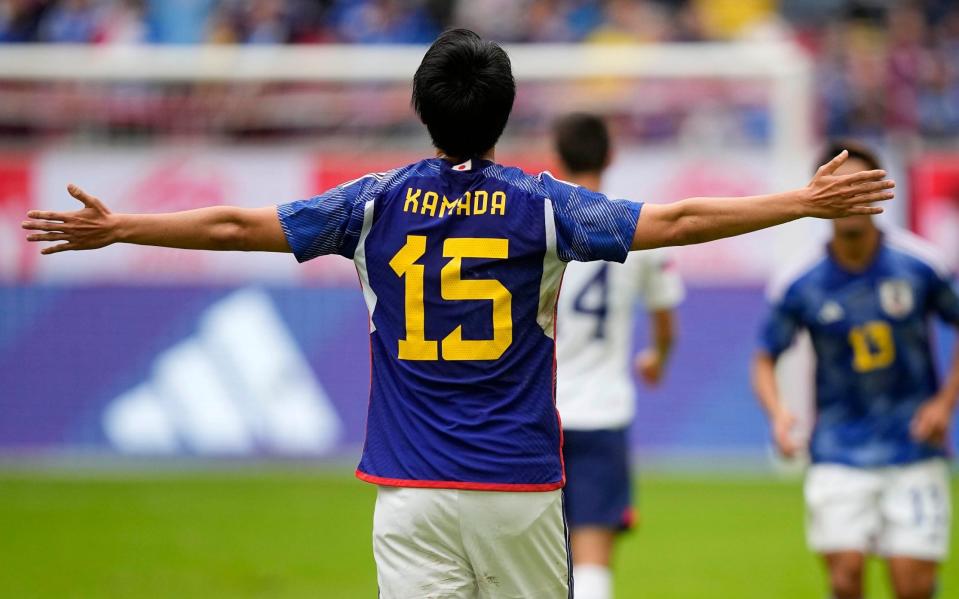 Japan's Daichi Kamada celebrates after scoring during the international friendly soccer match between USA and Japan as part of the Kirin Challenge Cup in Duesseldorf, Germany - Japan World Cup 2022 squad list, fixtures and latest odds - AP/Martin Meissner