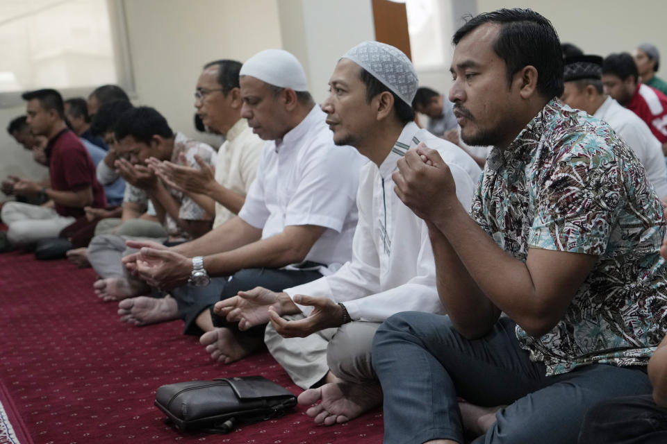 Indonesian Muslims pray for the safety of the Palestinian people during a Friday prayer at Abu Bakar Ashshiddiq Mosque in Jakarta, Indonesia, Friday, Oct. 13, 2023. As violence and tensions increase in the Gaza Strip with Israeli airstrikes after an unprecedented Hamas attack, Islamic leaders in Indonesia, the world's most populous Muslim-majority nation, appealed to all mosques across the country to pray for peace and safety for the Palestinian people. (AP Photo/Achmad Ibrahim)