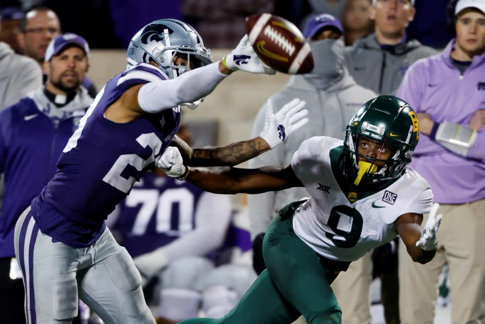 Kansas State cornerback Julius Brents, left, knocks a pass away from Baylor receiver Tyquan Thornton. Brents could be an immediate contributor for the Bengals if they draft him on Friday.