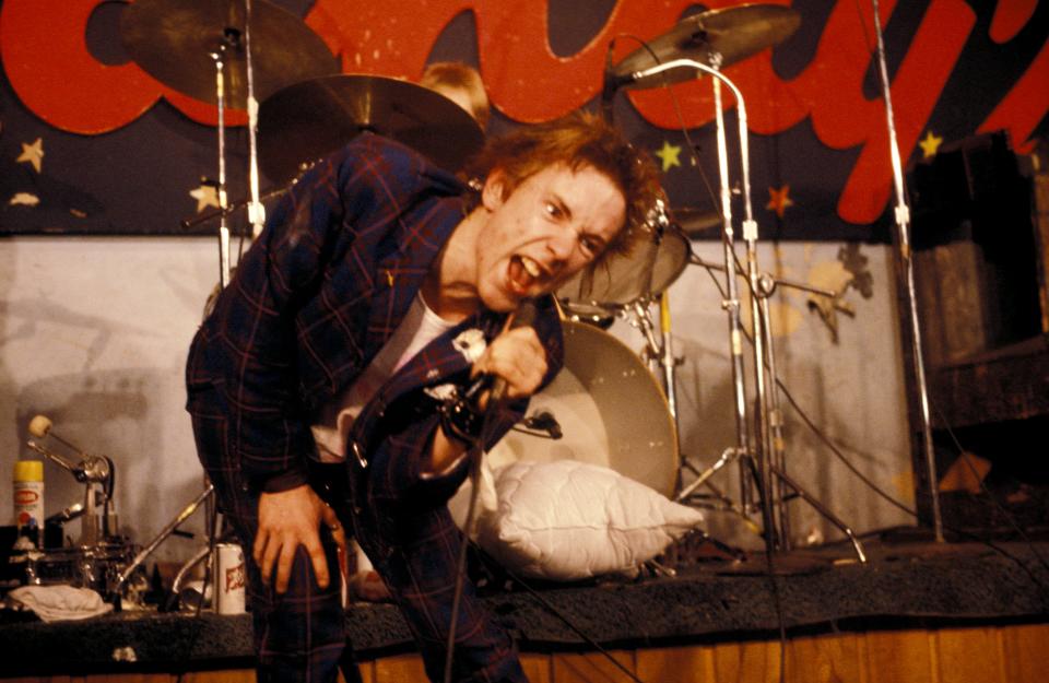 UNITED STATES - JANUARY 08:  TEXAS  Photo of Johnny ROTTEN and SEX PISTOLS, Johnny Rotten (John Lydon) performing live onstage at Randy's Rodeo Nightclub, San Antonio, on final tour  (Photo by Richard E. Aaron/Redferns)