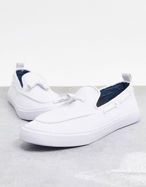 17) ASOS DESIGN slip on sneakers in white with tassel