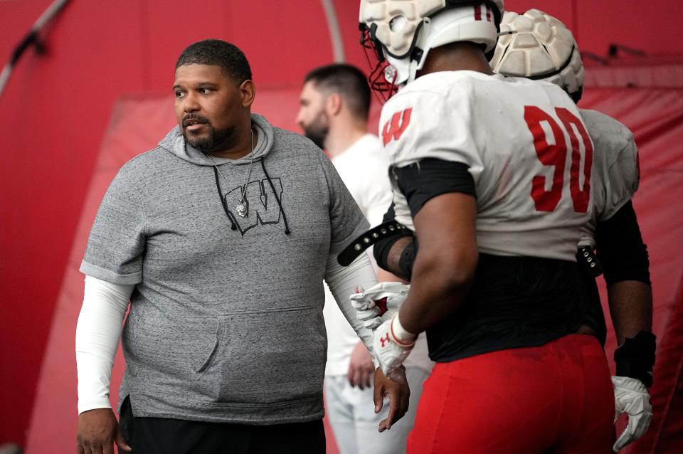 E.J. Whitlow spent two seasons as defensive line coach at Air Force, where the Falcons generally ran a 3-3-5 scheme. Whitlow is in his first season as defensive line coach for UW, which ran a lot of two-man fronts last season.
