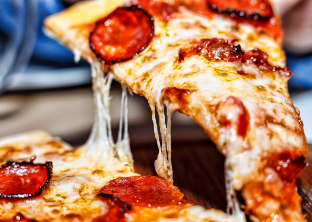 Crispy pepperoni pizza slice.