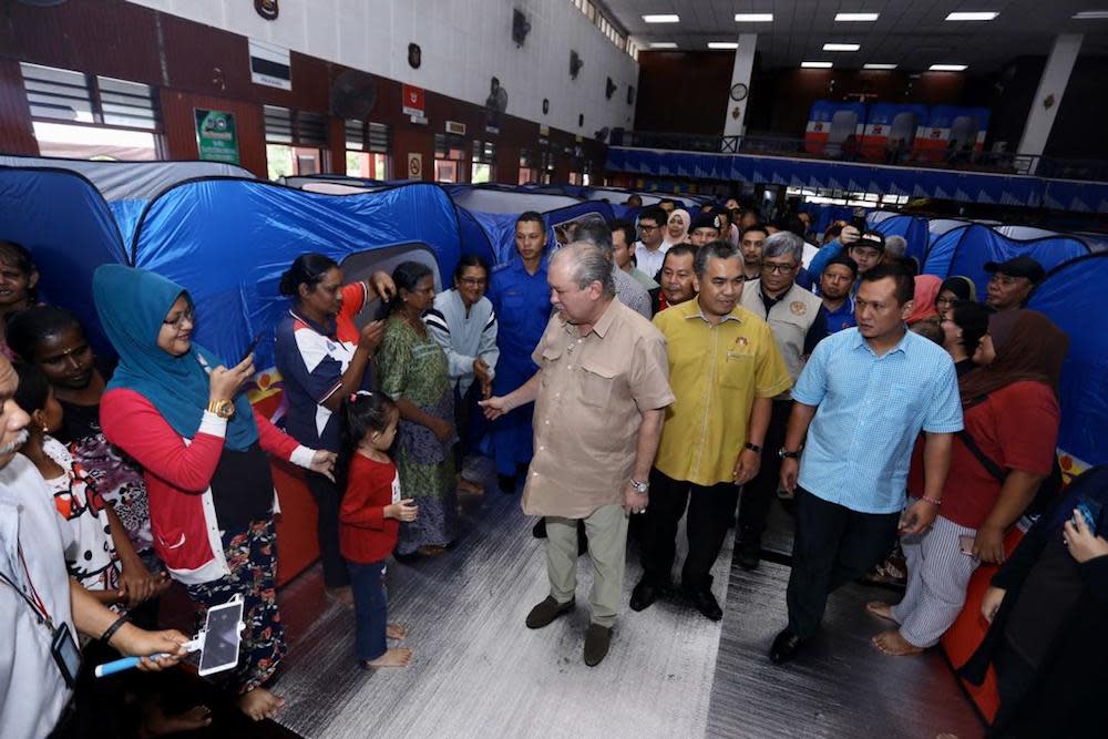 Johor ruler Sultan Ibrahim Sultan Iskandar visits some of the 500 flood victims who are temporary relocated at the Kolej Vokasional Kota Tinggi in Kota Tinggi December 11, 2019. — Picture courtesy of Royal Press Office