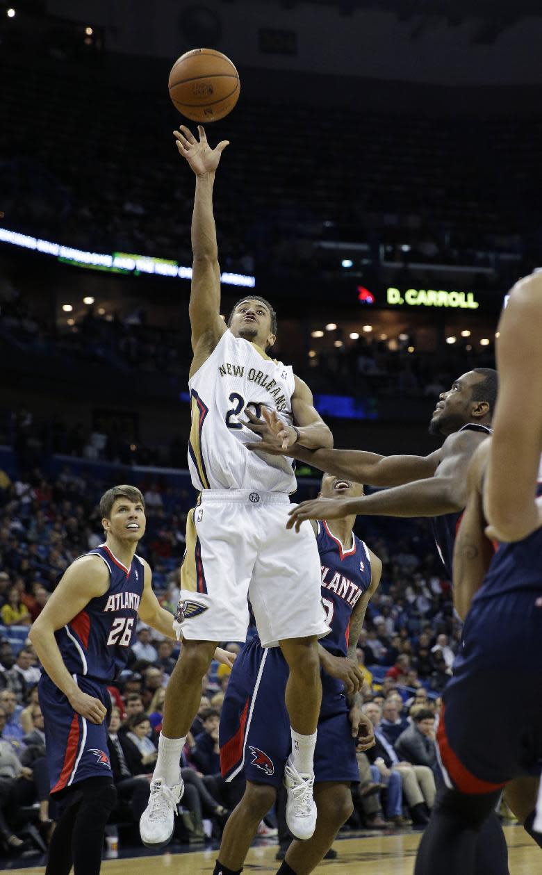 New Orleans Pelicans guard Brian Roberts (22) shoots during the second half of an NBA basketball game against the Atlanta Hawks in New Orleans, Wednesday, Feb. 5, 2014. The Pelicans won 105-100. (AP Photo/Gerald Herbert)