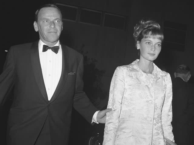 <p>Bettmann</p> Frank Sinatra and Mia Farrow arrive at the Bistro Restaurant for a black-tie party.