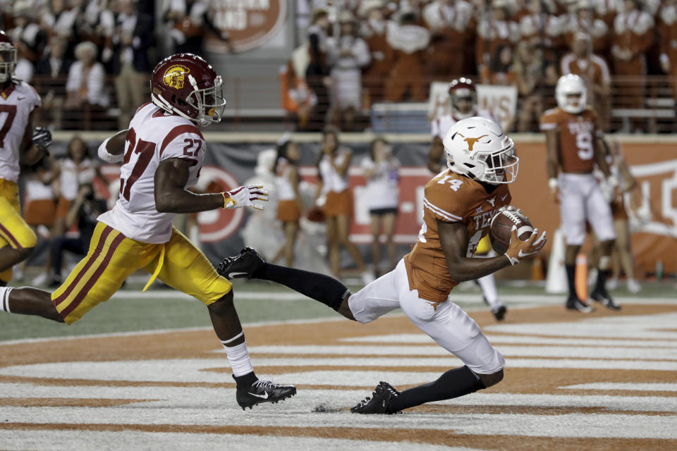 Texas’ Joshua Moore hauled in an impressive touchdown pass in the second half vs. USC. (Photo by Tim Warner/Getty Images)