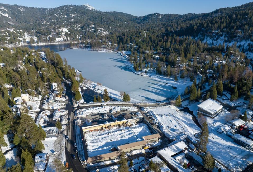 The collapsed roof of Goodwin's Market (foreground) in the San Bernardino Mountain community of Crestline.