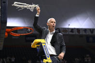 UConn head coach Dan Hurley celebrates at the end an NCAA college basketball game against Seton Hall after his team won its first outright Big East regular-season title in 25 years Sunday, March 3, 2024, in Storrs, Conn. (AP Photo/Jessica Hill)