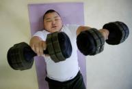 The Wider Image: Meet Kyuta: the 10-year-old, 85-kilo sumo in training