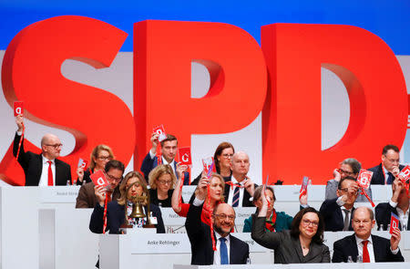 Delegates vote during an SPD party convention in Berlin, Germany, December 7, 2017. REUTERS/Fabrizio Bensch