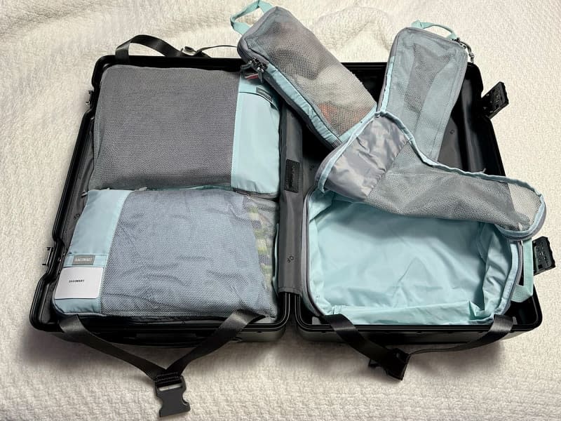 Bagsmart compression packing cubes in suitcase.