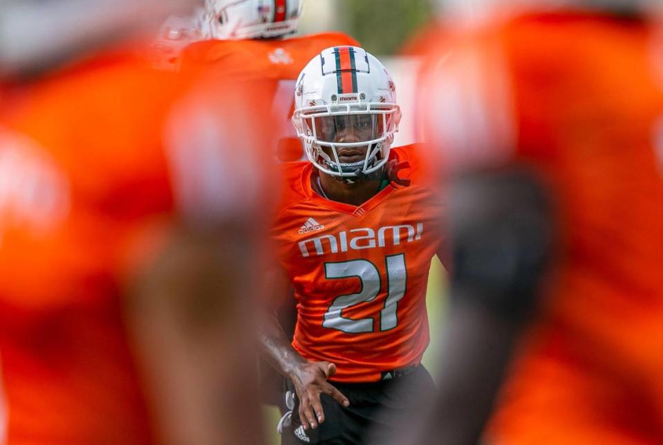 Miami Hurricanes running back Henry Parrish, Jr. (21) runs drills with his team at the University of Miami’s Greentree Practice Fields on Monday, Aug. 8, 2022, in Coral Gables, Fla.