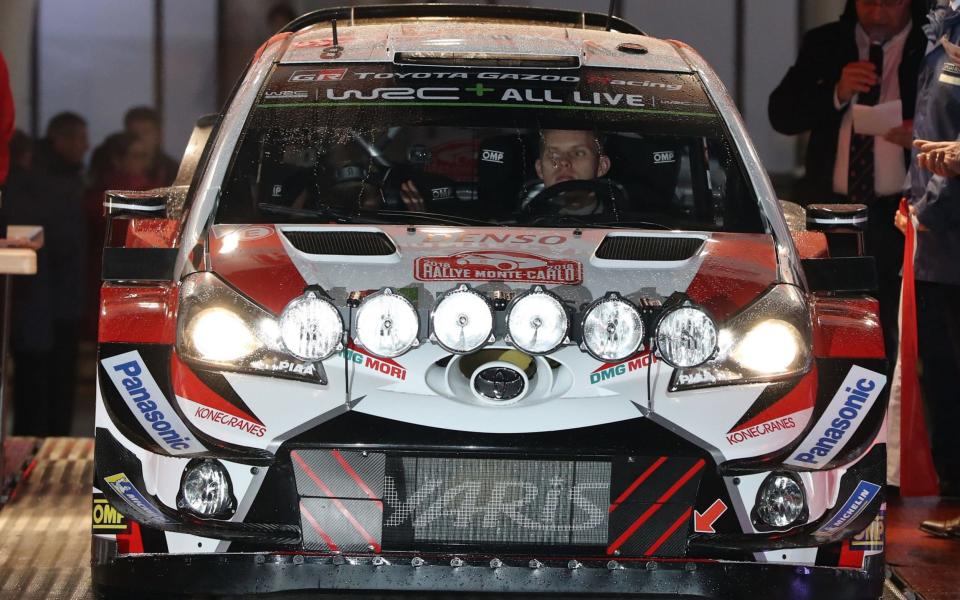 Estonian driver Ott Tanak at the start of the 2018 Monte Carlo Rally, before heading into the pitch-black mountains high above Monaco - AFP