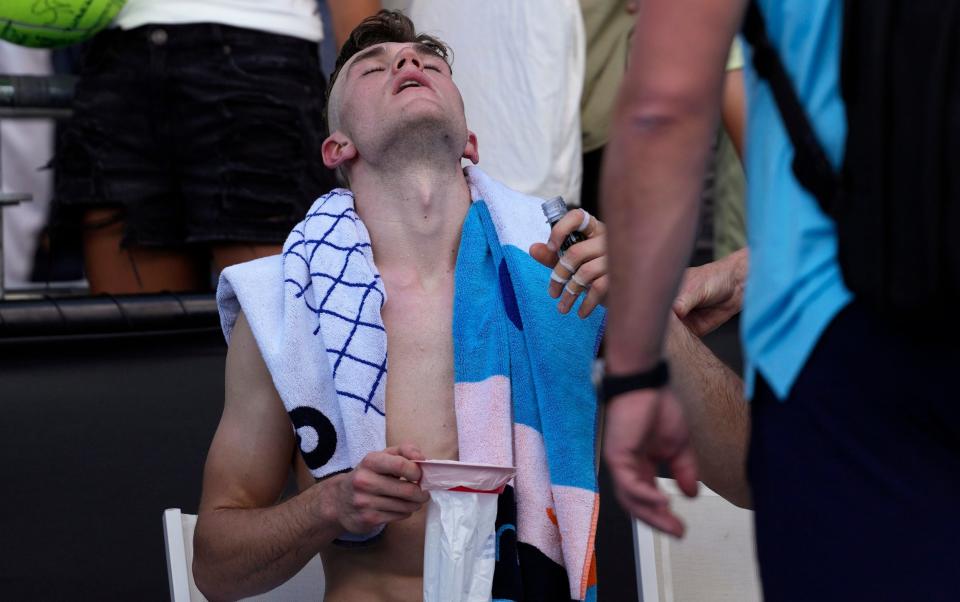 Jack Draper of Britain reacts after defeating Marcos Giron of the US in their first round match at the Australian Open tennis championships at Melbourne Park, Melbourne, Australia, Tuesday, Jan. 16, 2024