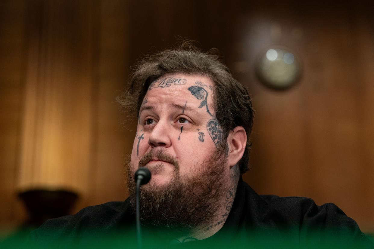 WASHINGTON, DC - JANUARY 11: American singer and songwriter Jelly Roll gets ready to testify before the Senate Banking, Housing, and Urban Affairs committee on January 11, 2024 in Washington, DC. The hearing examines legislative solutions and public education to stopping the flow of fentanyl into and throughout the United States. (Photo by Kent Nishimura/Getty Images)