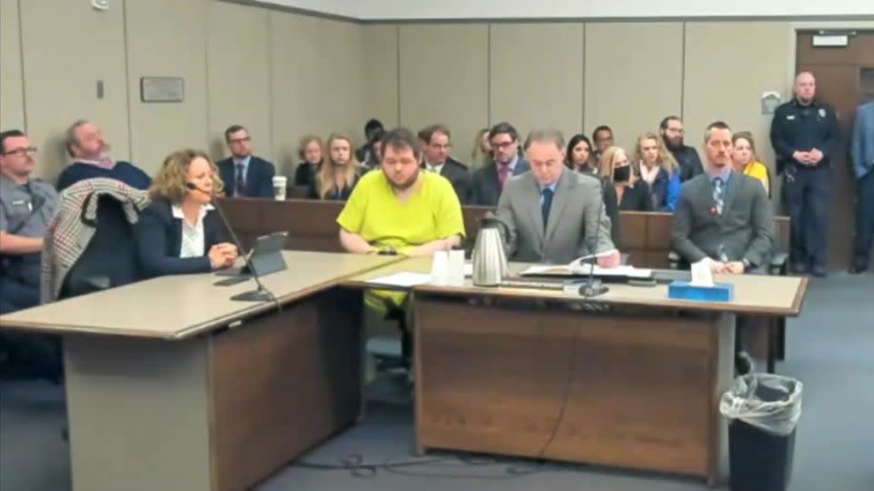 Anderson Lee Aldrich, center, sits during a court appearance in Colorado Springs in November 2022. – El Paso County District Court/AP