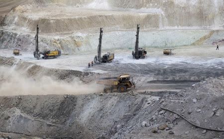 A truck arrives to ferry excavated gold, copper and zinc ore from the main mining pit at the Bisha Mining Share Company (BMSC) in Eritrea, operated by Canadian company Nevsun Resources, February 17, 2016. REUTERS/Thomas Mukoya/File Photo