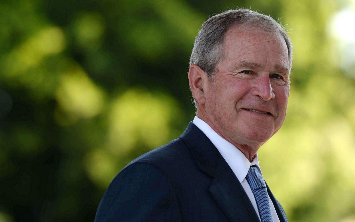 George W. Bush - MONIRUL BHUIYAN/AFP 