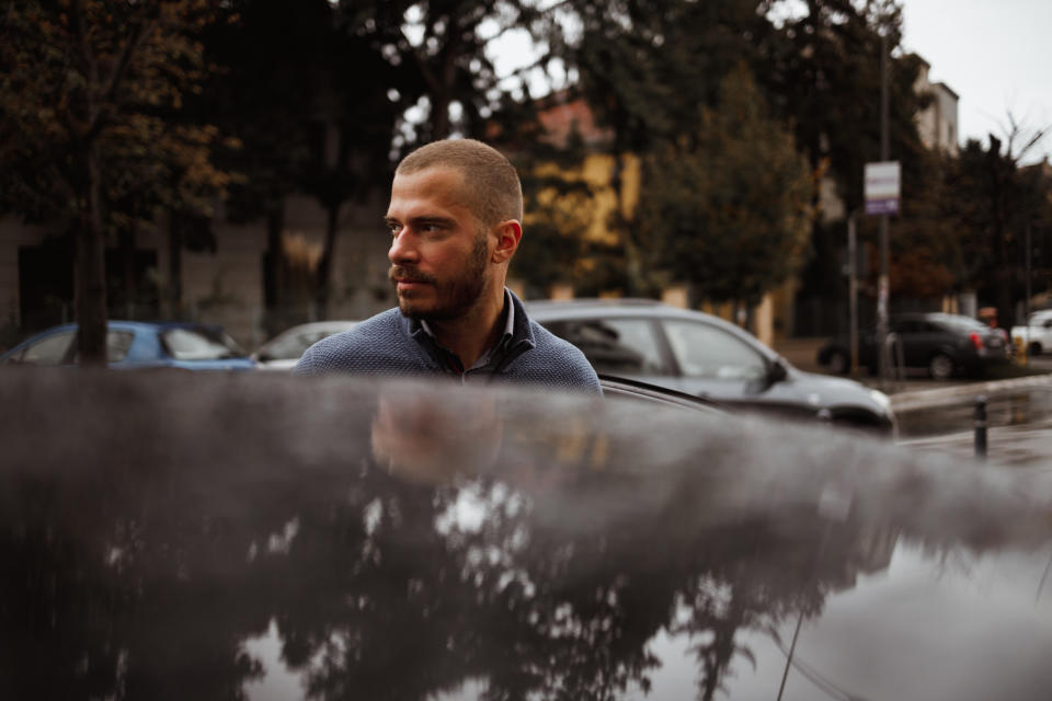 A  man getting out of the car. Source: Getty Images