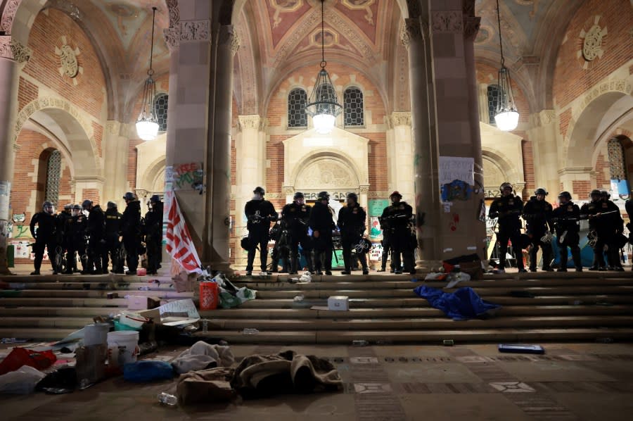 LOS ANGELES, CALIFORNIA – May 2: Police officers take control of Royce Hall after pushing back pro-Palestinian protesters after an oder to disperse was given at UCLA early Thursday morning. (Wally Skalij/Los Angeles Times via Getty Images)