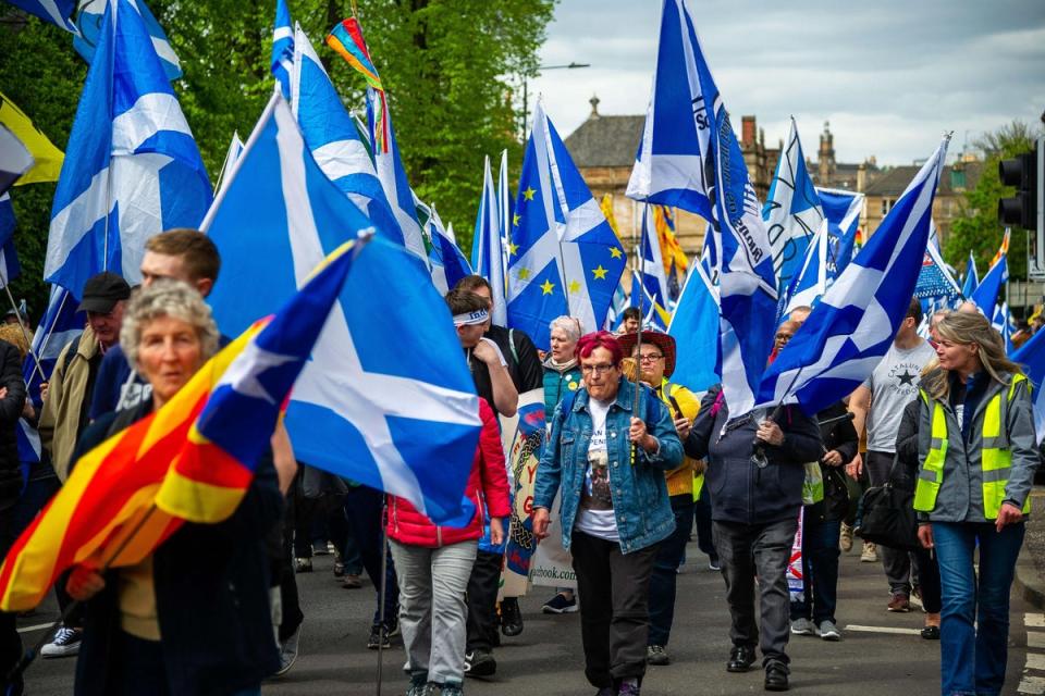 Thousands of Scottish independence supporters march through Glasgow as part of an All Under One Banner (AUOB) protest in January 2020  (Alamy/PA)