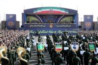 Iranian President Hassan Rouhani delivers a speech during the ceremony of the National Army Day parade in Tehran