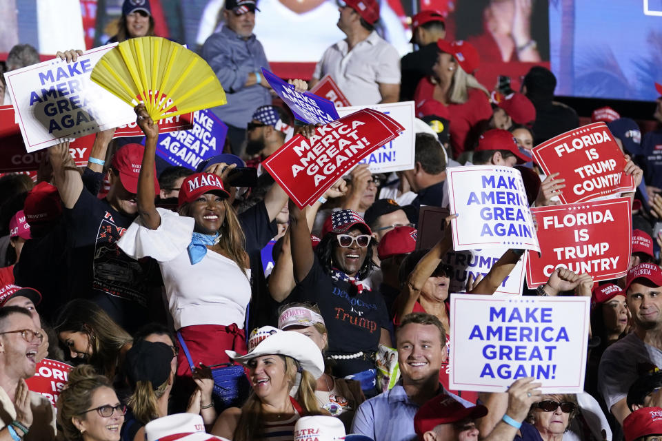 Attendees show their support for former President Donald Trump during a campaign rally in Hialeah, Fla., Wednesday, Nov. 8, 2023. (AP Photo/Lynne Sladky)