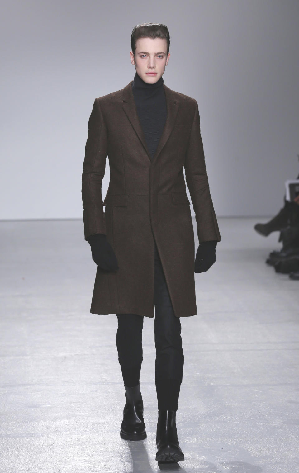 A model wears a creation by South Korean fashion designer Juun. J as part of his presentation for Men's 2013 fall-winter 2013/2014 men's fashion collection, presented in Paris, Friday, Jan.18, 2013. (AP Photo/Jacques Brinon)