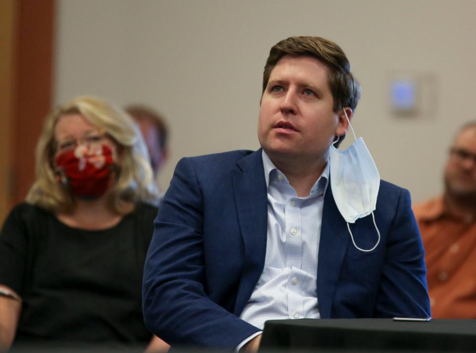 Marion County Commissioner Colm Willis asks a question during a work session about fire response and rebuilding efforts, in Cascade Hall at the Oregon State Fairgrounds on Sept. 29.