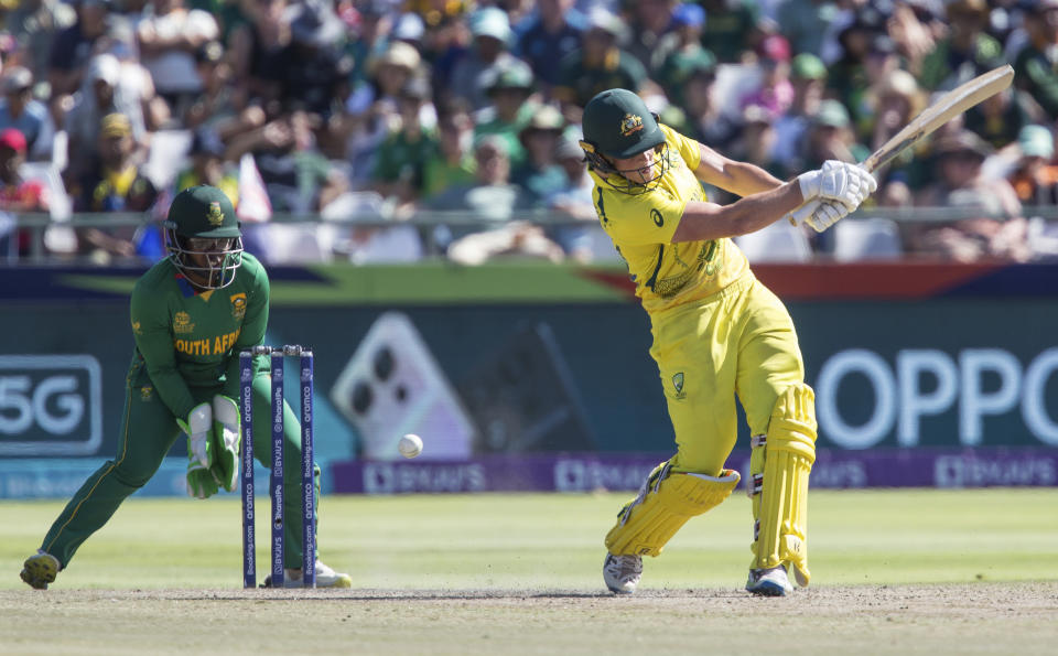 Australia's Grace Harris swings and misses a shot, during the Women's T20 World Cup semi final cricket match between South Africa and Australia, in Cape Town, South Africa, Sunday Feb. 26, 2023. (AP Photo/Halden Krog)