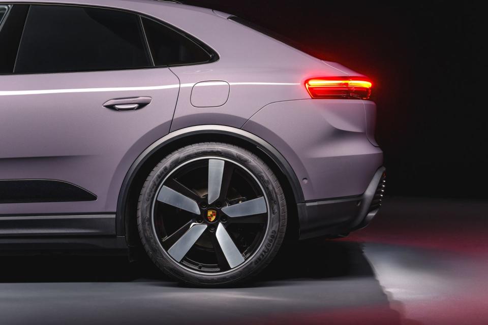 2024 porsche macan ev in pastel colors under a photo studio