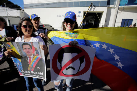 Venezuelans living in Honduras hold a protest against Venezuelan President Nicolas Maduro's government in Tegucigalpa, Honduras January 23, 2019. REUTERS/Jorge Cabrera