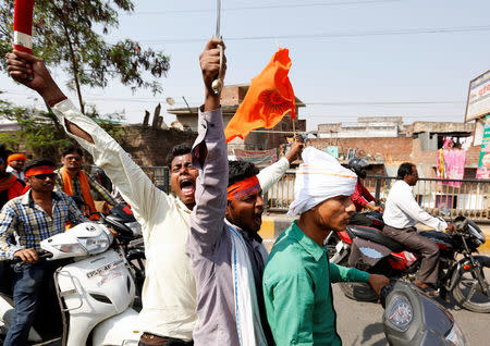 Hindu Yuva Vahini vigilante members take part in a rally in the city of Unnao, India, April 5, 2017. REUTERS/Cathal McNaughton