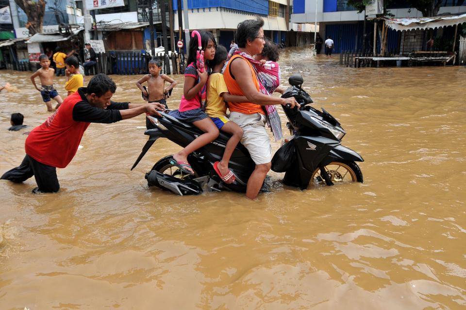 Jakarta flood motorcycle