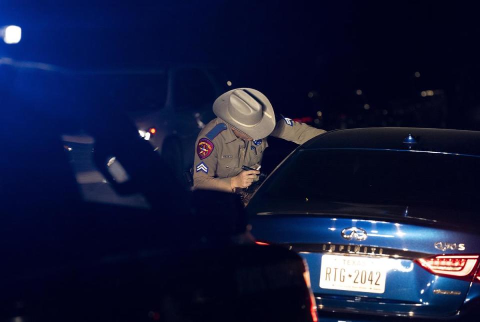 DPS troopers make a traffic stop in southeast Austin on Aug. 7, 2023.
