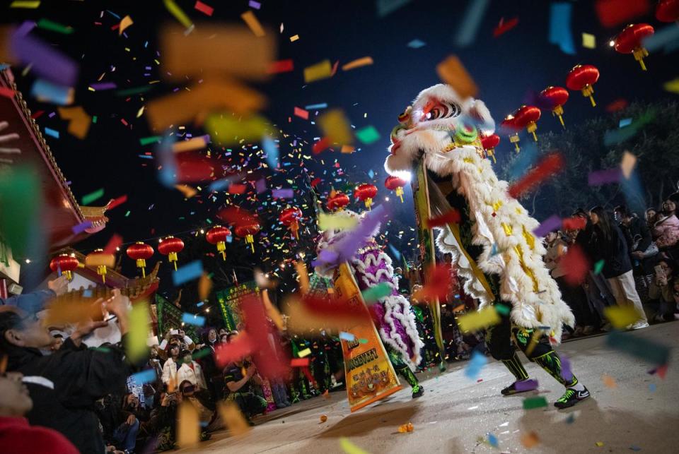 Lion dancers ring in the Lunar New Year at the Teo Chew Temple in Houston on Jan. 22, 2023.