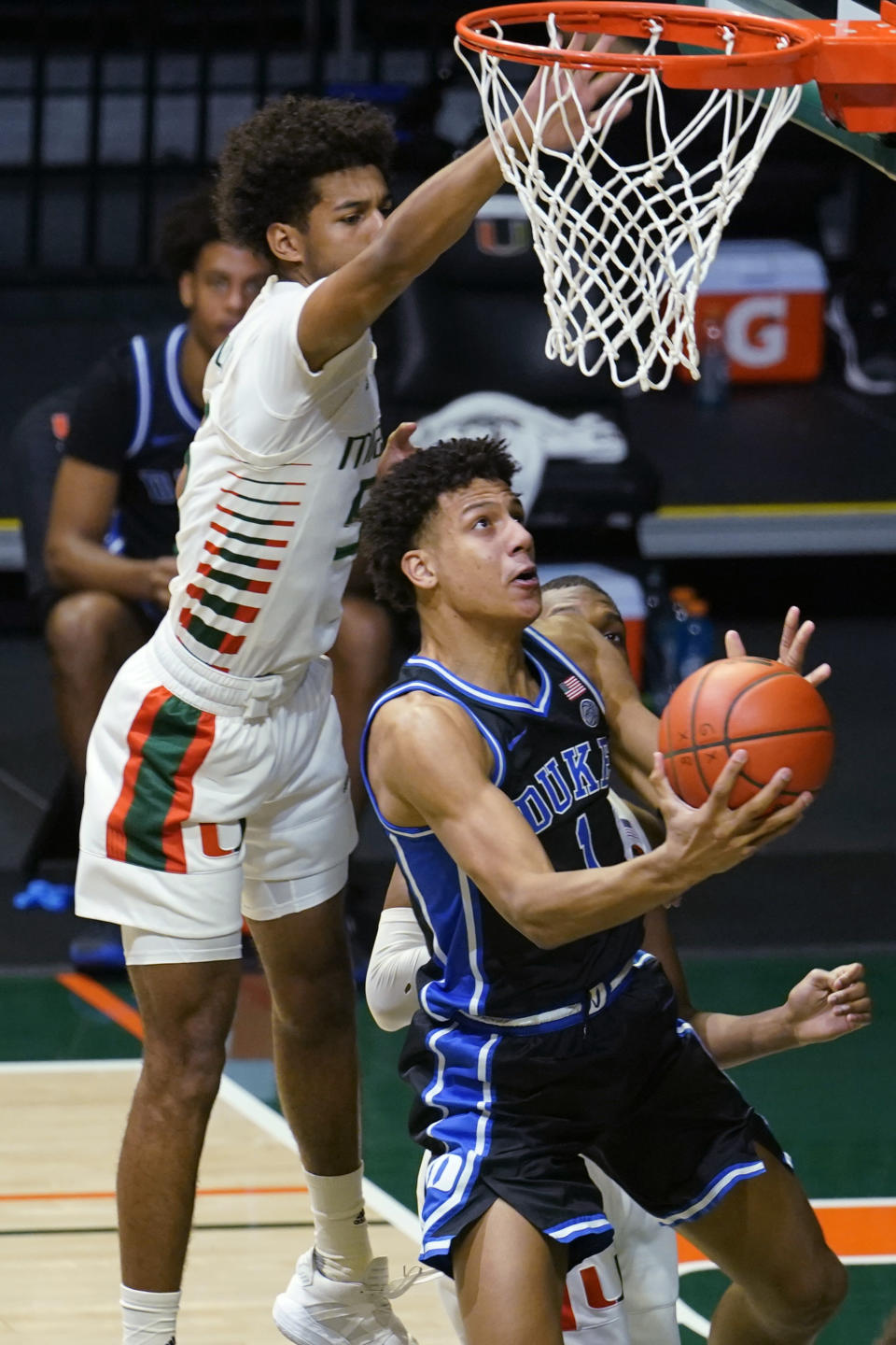 FILE - In this Feb. 1, 2021, file photo, Duke forward Jalen Johnson (1) drives to the basket as Miami guard Harlond Beverly (5) defends during an NCAA college basketball game in Coral Gables, Fla. Johnson was selected by the Atlanta Hawks in the NBA draft Thursday, July 29. (AP Photo/Marta Lavandier, File)