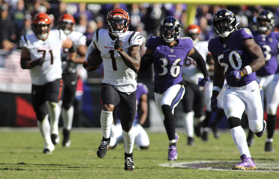 Cincinnati Bengals wide receiver Ja'Marr Chase (1) scores a touchdown during an NFL football game against the Baltimore Ravens, Sunday, Oct. 24, 2021 in Baltimore, Md. (AP Photo/Daniel Kucin Jr.)