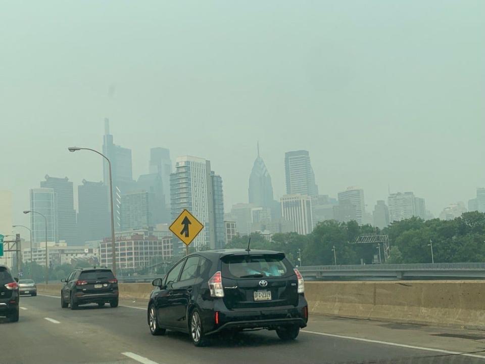 Haze from Canadian wildfire smoke smothers the Philadelphia skyline on Route 76 near 30th Street Station on Wednesday, June 7, 2023.