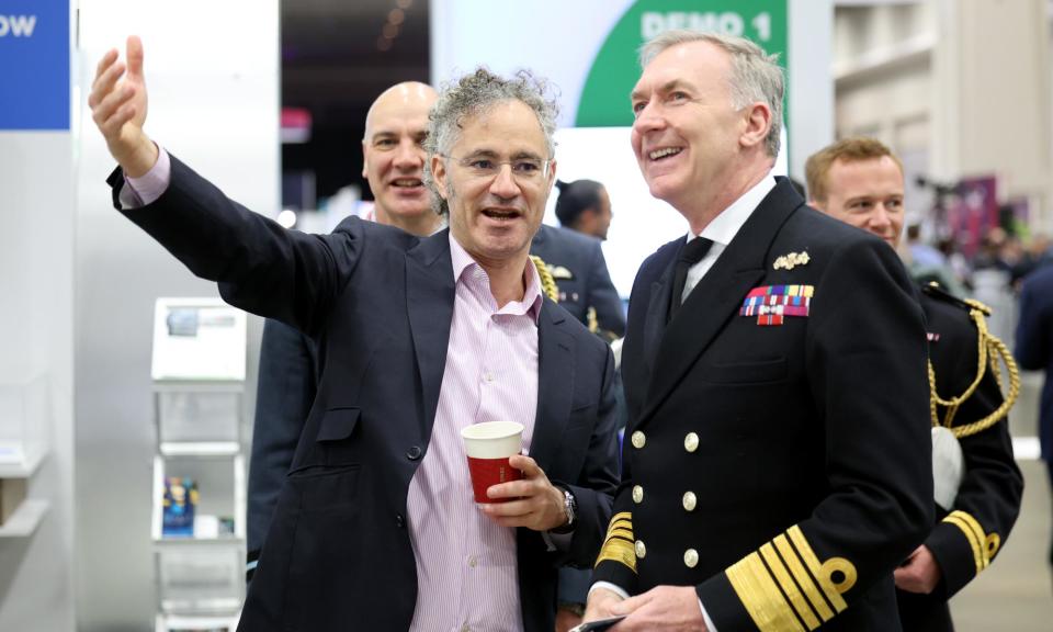 <span>The co-founder and CEO of Palantir, Alex Karp, and Adm Tony Radakin at the event last week.</span><span>Photograph: Tasos Katopodis/Getty Images for Palantir</span>