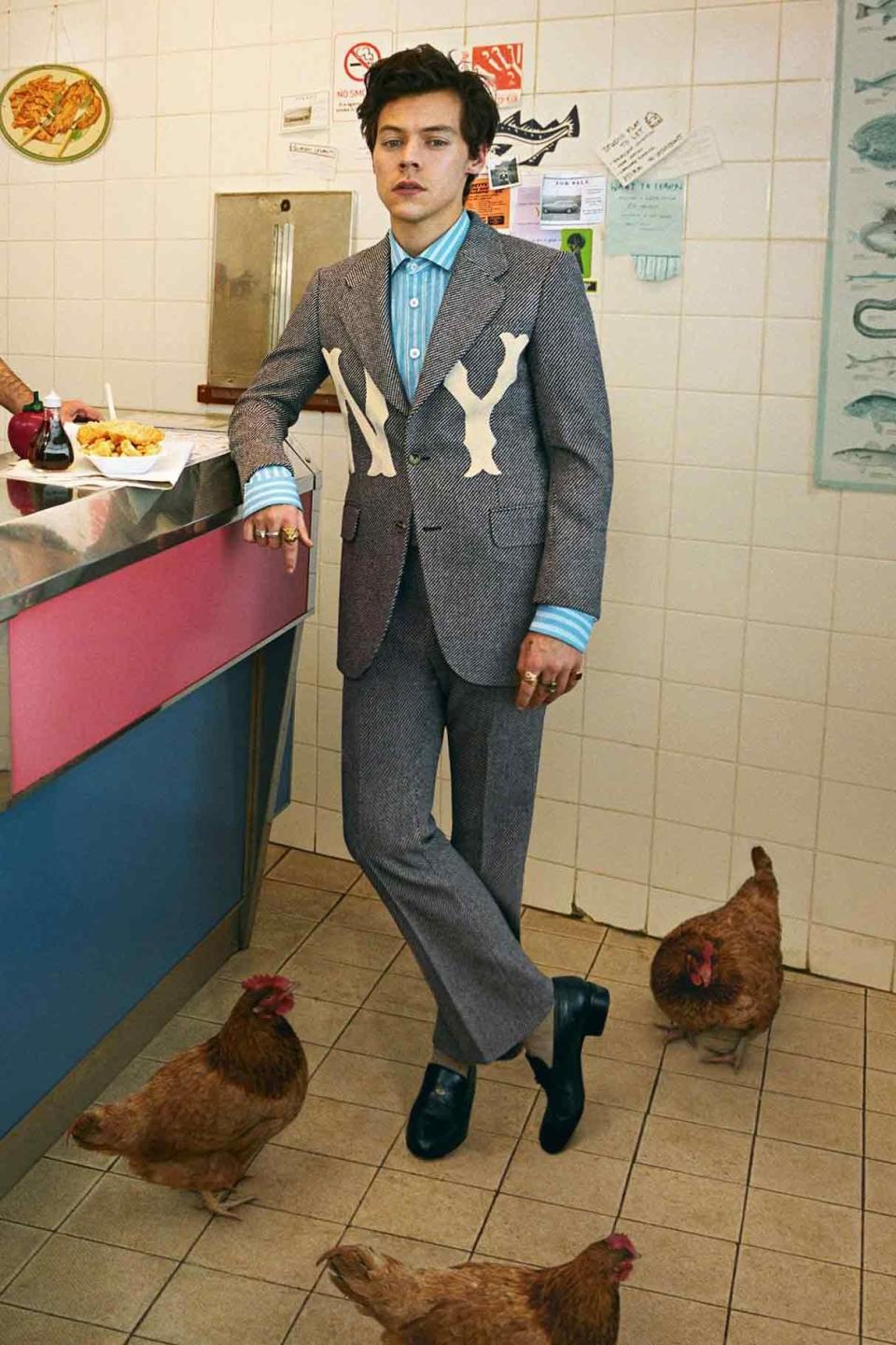 In Gucci at the chippy shop for his first-ever Gucci tailoring campaign shoot.