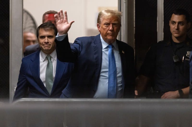 Former President Donald Trump returns to the courtroom after a break in his criminal trial at Manhattan Criminal Court in New York on Friday. Pool Photo by Jeenah Moon/UPI