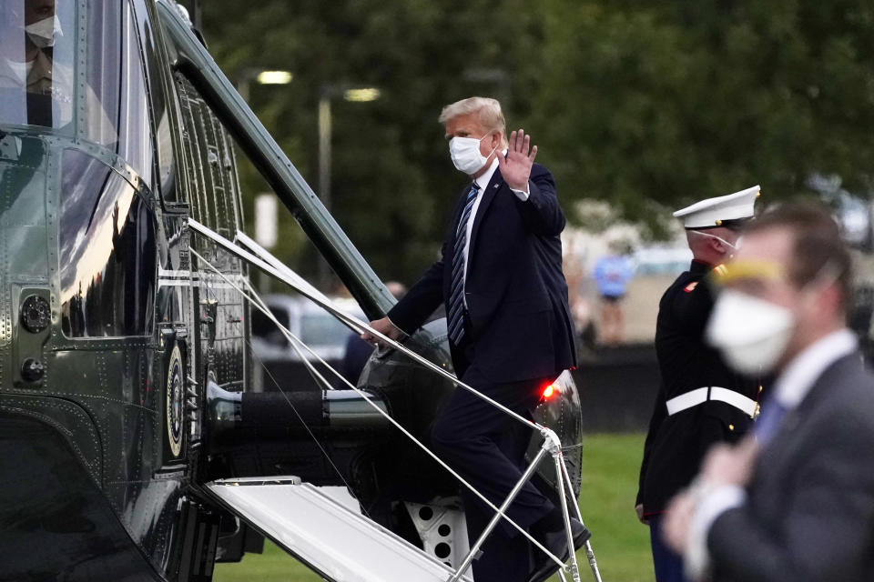 President Donald Trump boards Marine One to return to the White House after receiving treatments for covid-19 at Walter Reed National Military Medical Center, Monday, Oct. 5, 2020, in Bethesda, Md. (AP Photo/Evan Vucci)