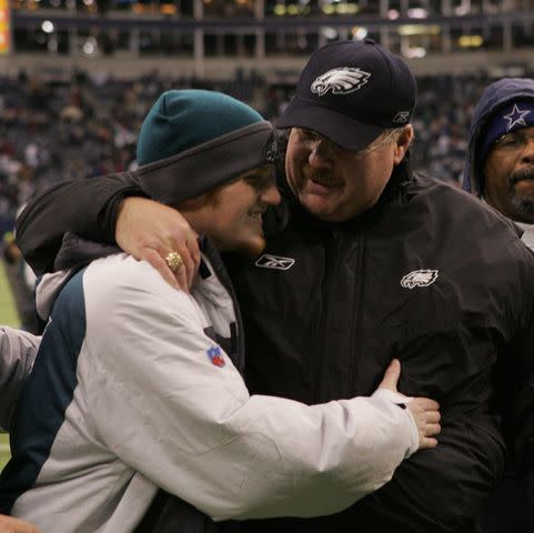 <p>Drew Hallowell/Getty </p> Andy Reid and his son Britt Reid celebrate a Philadelphia Eagles win in December 2006.
