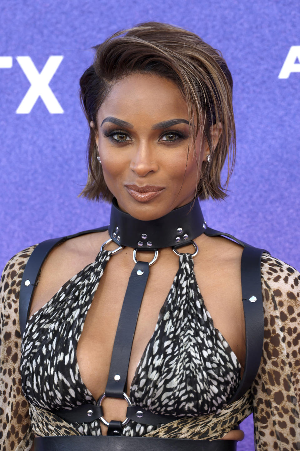 <p> Colored contacts weren't the only bold thing about this look! Ciara's wispy, caramel-hued pixie cut at Billboard's Women in Music event has me watching to chop all of my hair off.  </p>