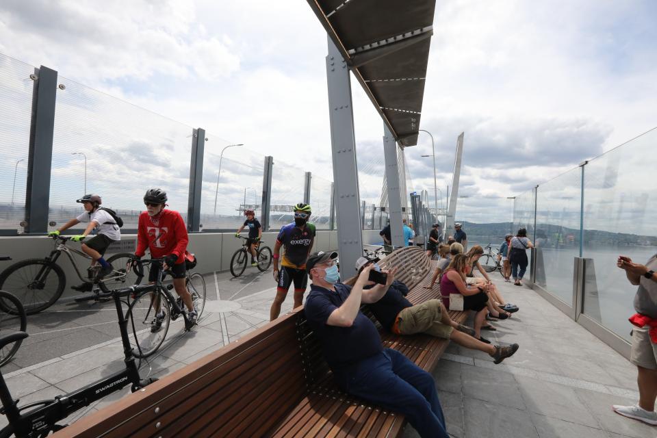 Bikers and walkers on the opening day of the shared use path on the Gov. Mario Cuomo Bridge June 15, 2020. The New York State Thruway says the path has seen more than 500,000 visitors since opening.