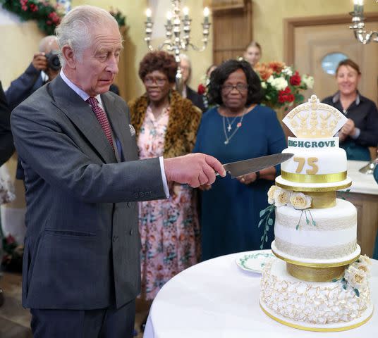 <p>CHRIS JACKSON/POOL/AFP via Getty</p> King Charles attends his 75th birthday party hosted by the Prince's Foundation on November 13.