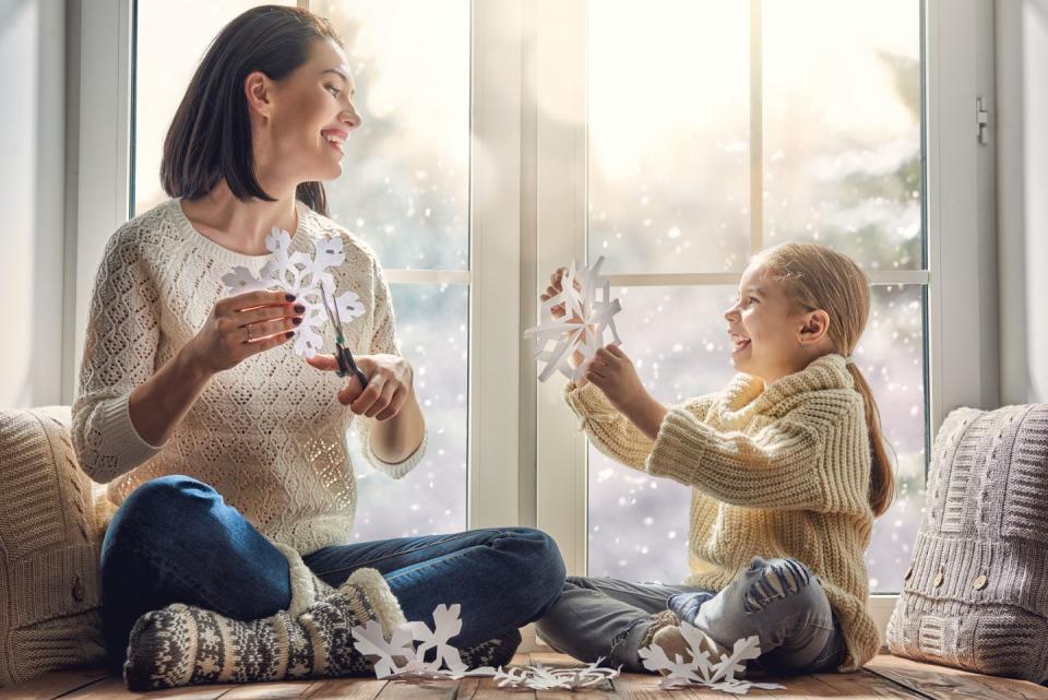 15) Make paper snowflakes.